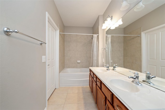 bathroom with tile patterned flooring, vanity, and shower / bath combo