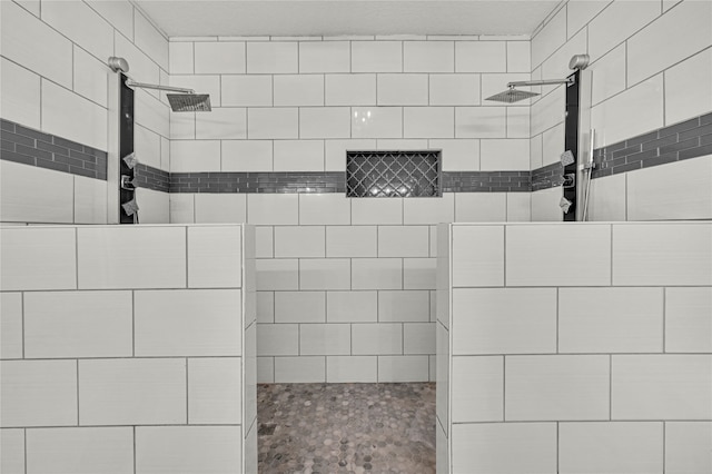 bathroom featuring a tile shower