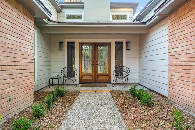 property entrance featuring french doors