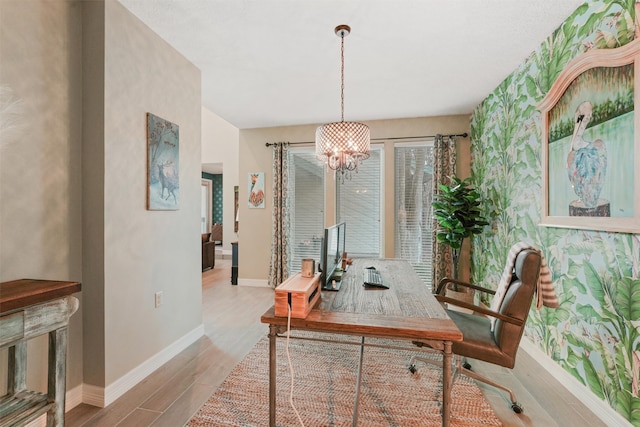 office featuring a notable chandelier and light wood-type flooring