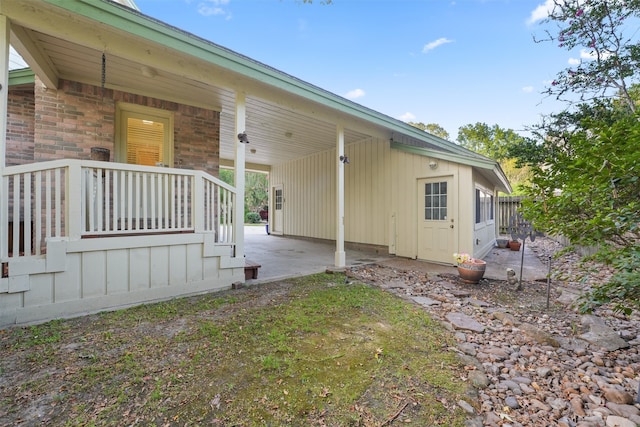 view of home's exterior featuring a porch