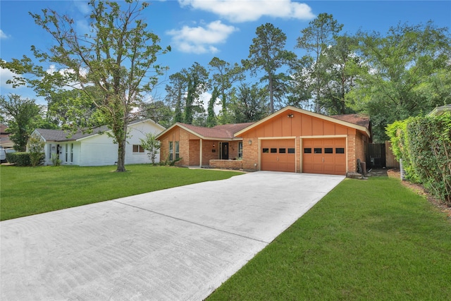 single story home featuring a garage and a front lawn