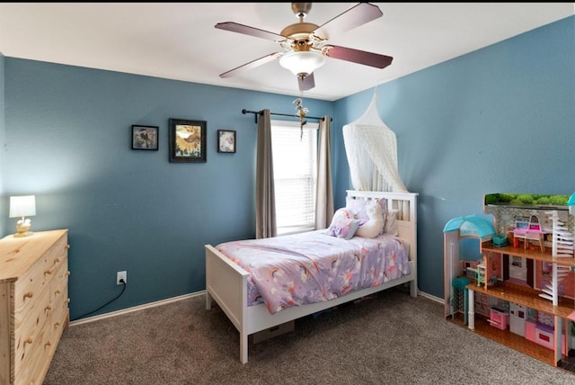 bedroom with ceiling fan and dark carpet