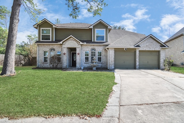 view of front facade featuring a garage and a front lawn