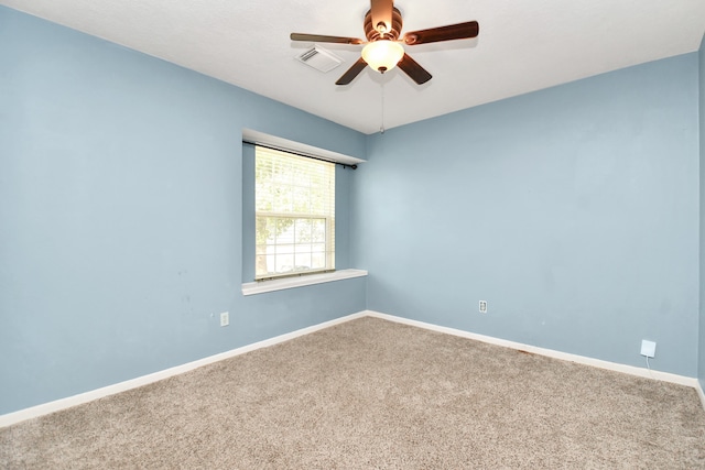 unfurnished room featuring carpet flooring and ceiling fan