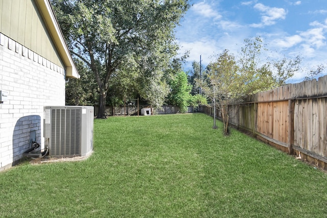 view of yard featuring central AC unit