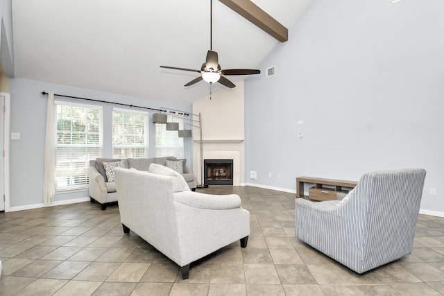 living room featuring beamed ceiling, light tile patterned floors, high vaulted ceiling, and ceiling fan