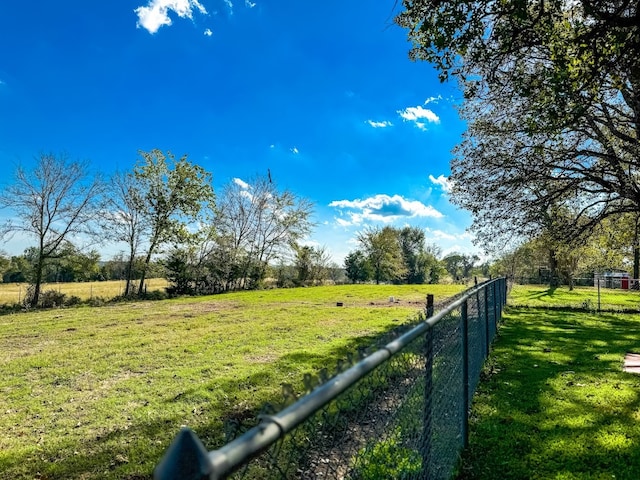 view of yard featuring a rural view