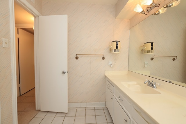 bathroom with tile patterned floors and vanity