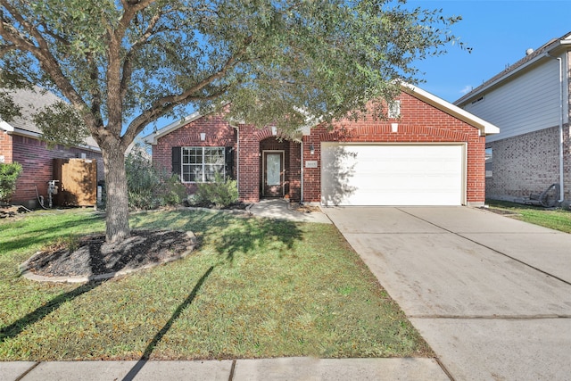 ranch-style home featuring a front yard and a garage