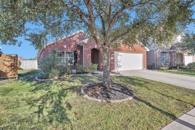 ranch-style home with a garage and a front lawn