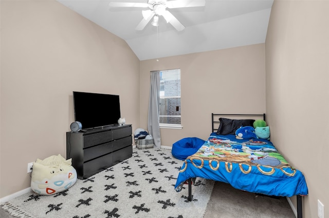 carpeted bedroom featuring ceiling fan and lofted ceiling