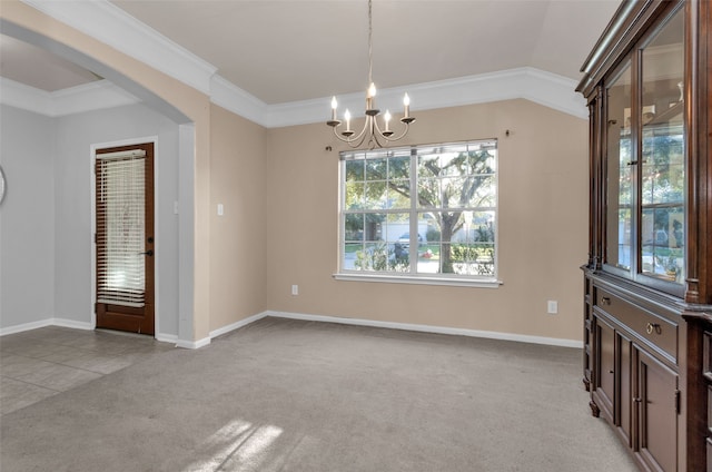 unfurnished dining area featuring a notable chandelier, light colored carpet, ornamental molding, and vaulted ceiling