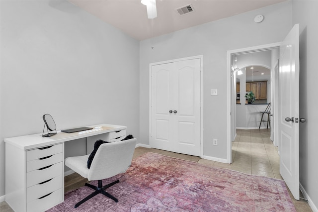 office area featuring ceiling fan and light tile patterned flooring