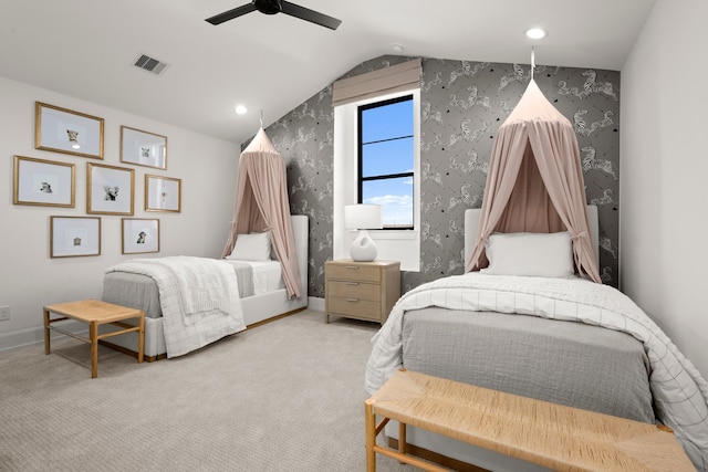 bedroom featuring ceiling fan, light carpet, and lofted ceiling