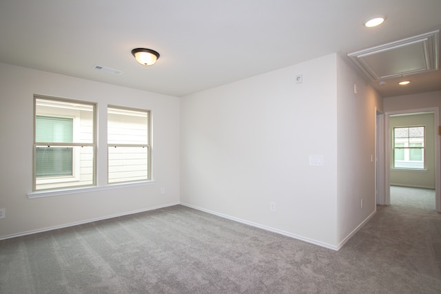 view of carpeted spare room