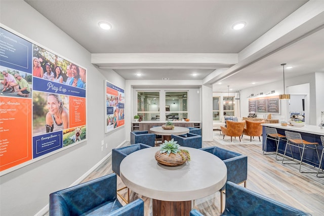 dining room with light hardwood / wood-style flooring