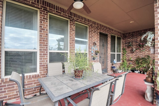 view of patio / terrace featuring ceiling fan