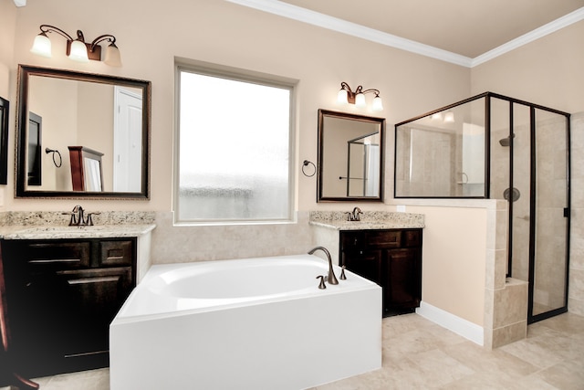 bathroom with ornamental molding, vanity, plenty of natural light, and independent shower and bath