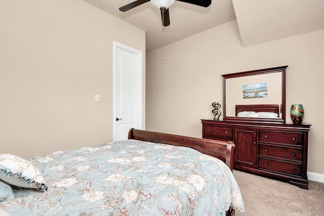 bedroom featuring light colored carpet and ceiling fan