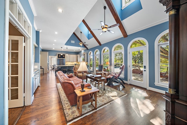 living room with ceiling fan, beamed ceiling, high vaulted ceiling, and dark wood-type flooring