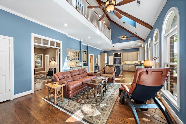 living room featuring ceiling fan, high vaulted ceiling, dark hardwood / wood-style floors, and ornamental molding