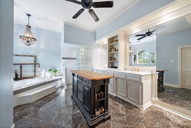 bathroom with ceiling fan, radiator heating unit, tiled tub, crown molding, and vanity