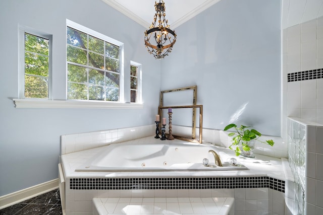 bathroom featuring ornamental molding and tiled bath