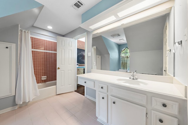 bathroom with tile patterned floors, vanity, and shower / tub combo with curtain