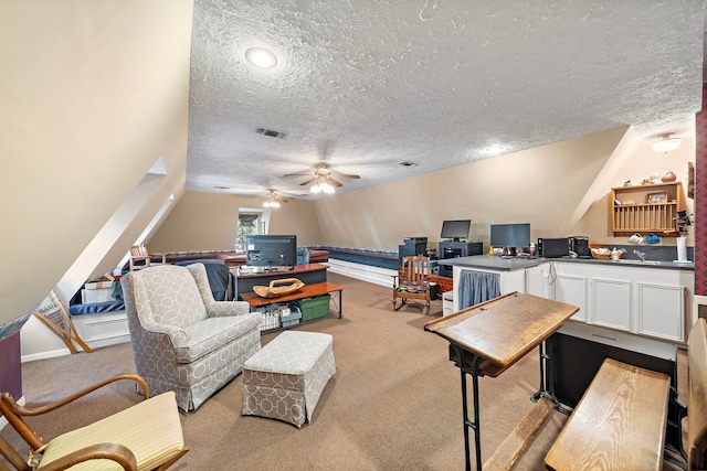 living room with a textured ceiling, light colored carpet, and lofted ceiling