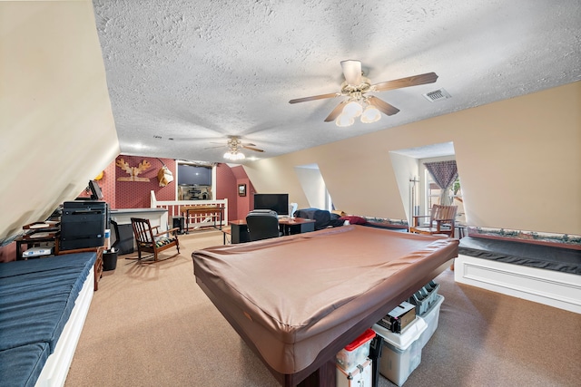 recreation room featuring lofted ceiling, a textured ceiling, and billiards