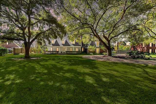 view of front of property with a front lawn