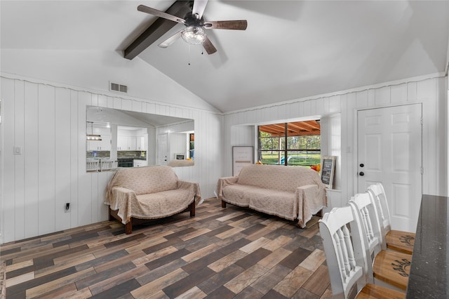 living room with ceiling fan, dark hardwood / wood-style flooring, and vaulted ceiling with beams