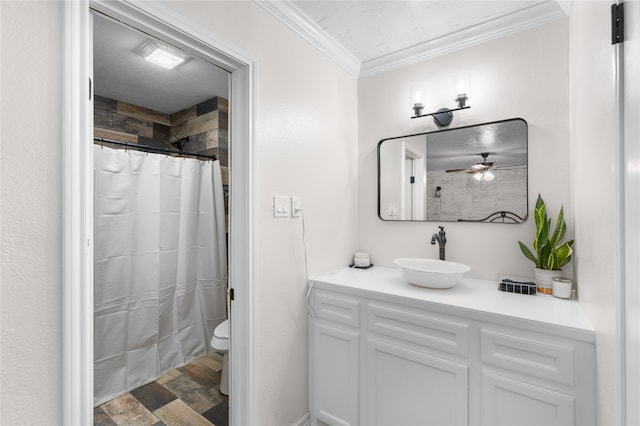 bathroom with ceiling fan, crown molding, toilet, vanity, and hardwood / wood-style flooring