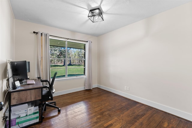 home office featuring dark hardwood / wood-style floors