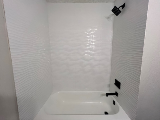 bathroom featuring washtub / shower combination