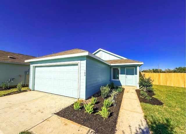 ranch-style house featuring a garage