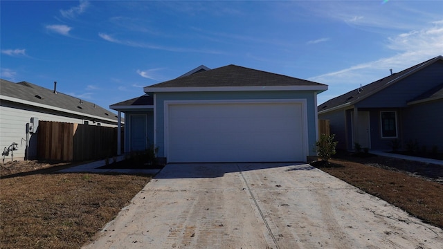 single story home featuring a garage