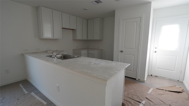 kitchen featuring sink and kitchen peninsula