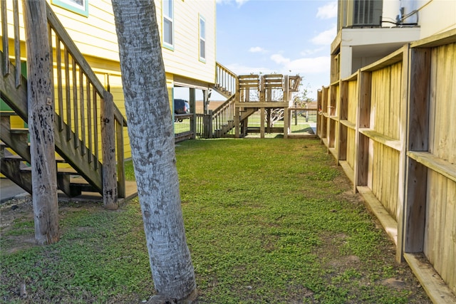 view of yard with central AC