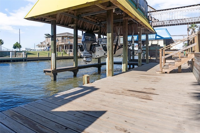 dock area featuring a water view