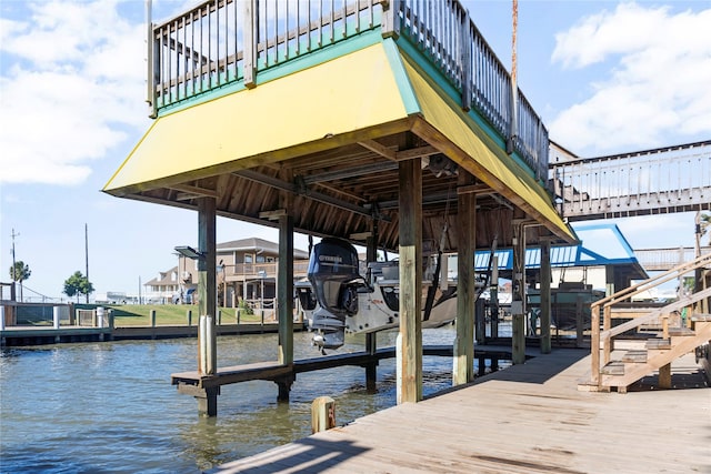 dock area with a water view