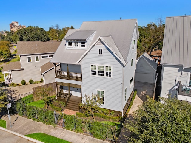 view of front of house with a balcony