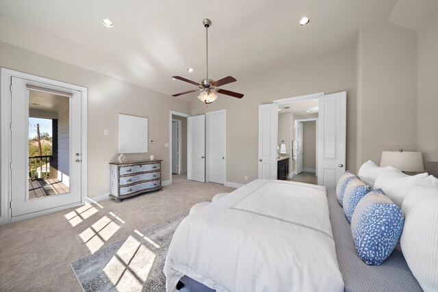 bedroom featuring ceiling fan, light carpet, access to outside, and connected bathroom