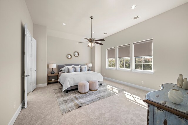 carpeted bedroom with ceiling fan