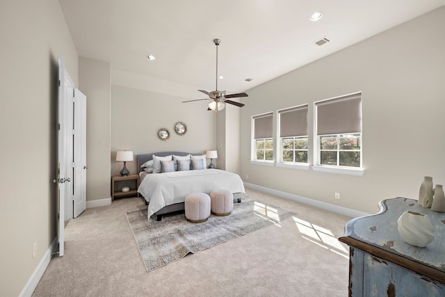 carpeted bedroom with ceiling fan