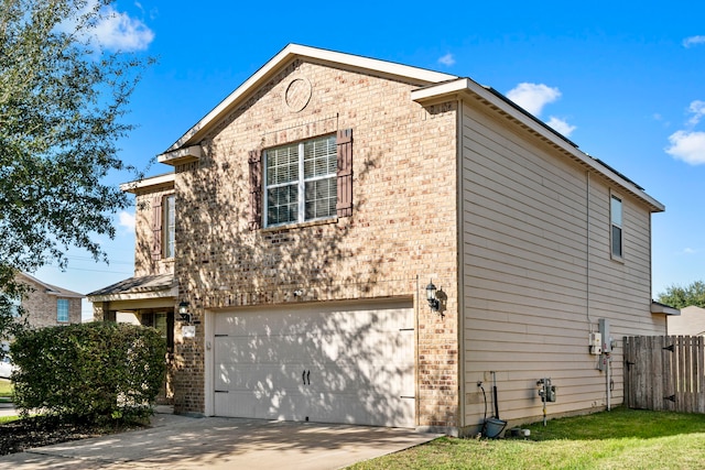 view of side of home with a garage