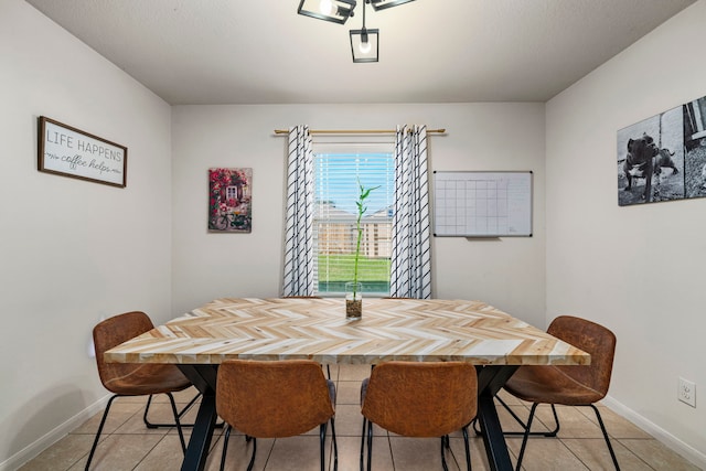 dining room with light tile patterned flooring