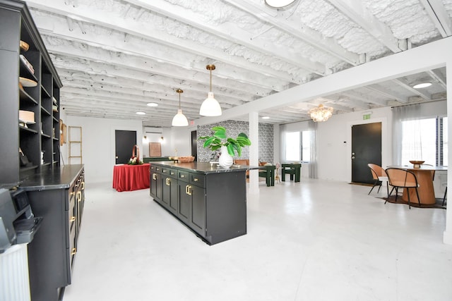 kitchen featuring a center island and decorative light fixtures