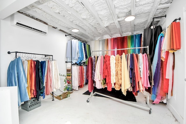 spacious closet with a wall unit AC